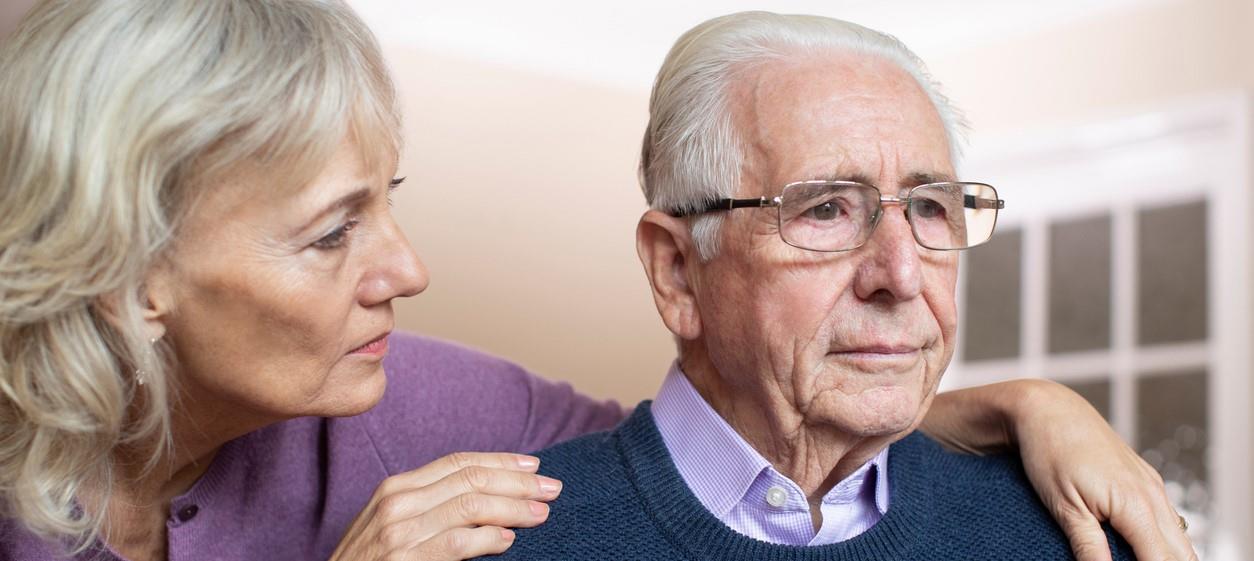 Dementia elderly lady with elderly man